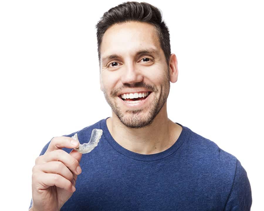 Young man wearing clear braces.