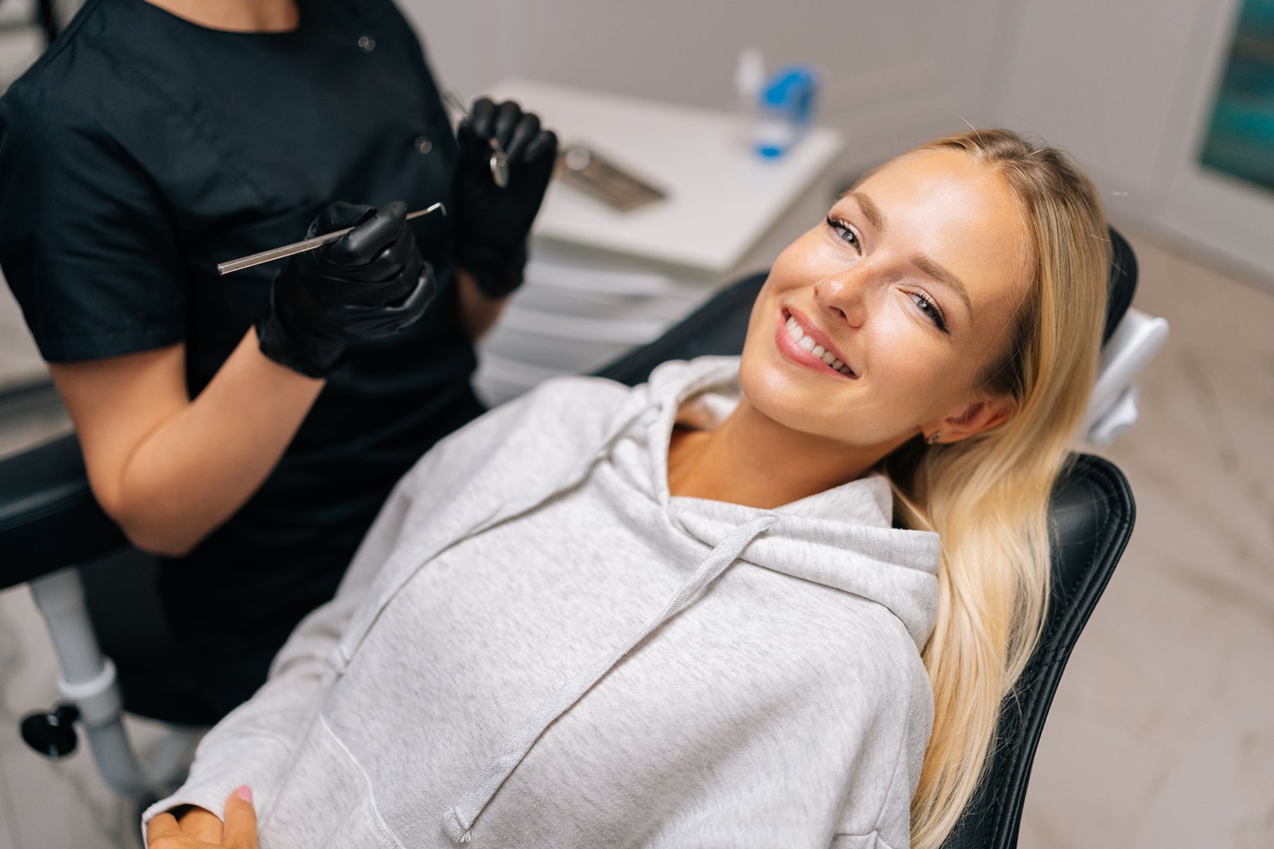 Women smiling after getting a dental exam in Tennessee